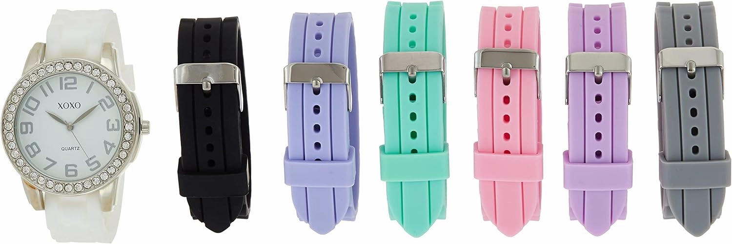 XOXO Women’s Silver-Tone Analog Watch with Crystal-Accent Bezel – 7 Interchangeable Silicone Bands – Stylish Quartz Timepiece with Adjustable Fit – Gift-Ready Box